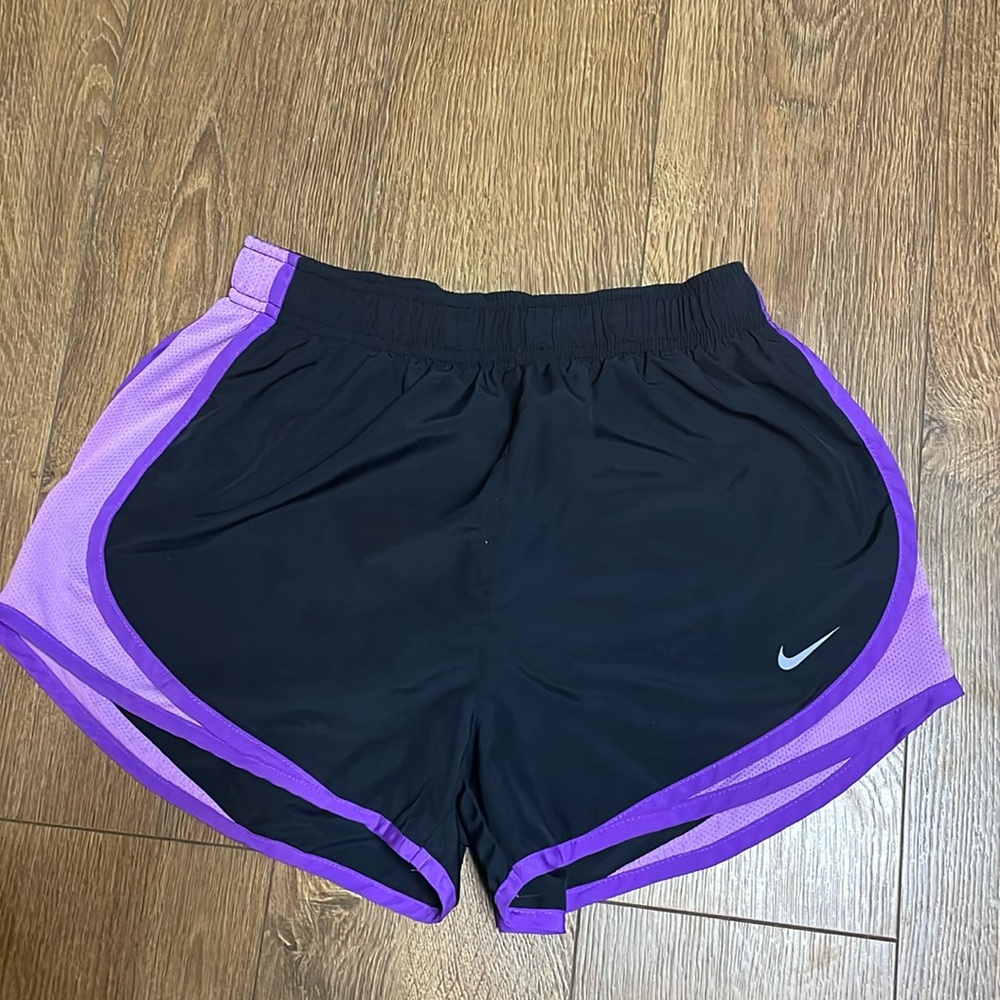 Purple and black Nike shorts